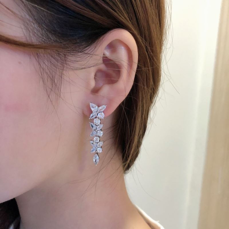 T*f*ny earrings